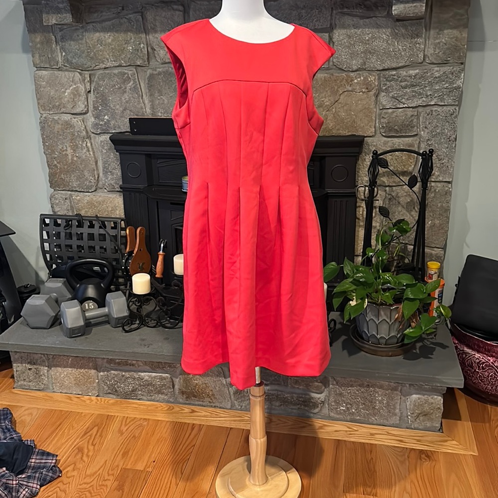 Skater dress material, orange dress. Brand new without tags